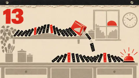 Domino Day cover art: A tear-off calendar page: a wave of black dominoes falls from a kitchen shelf to the counter, past red ones, into a ringing red bell.